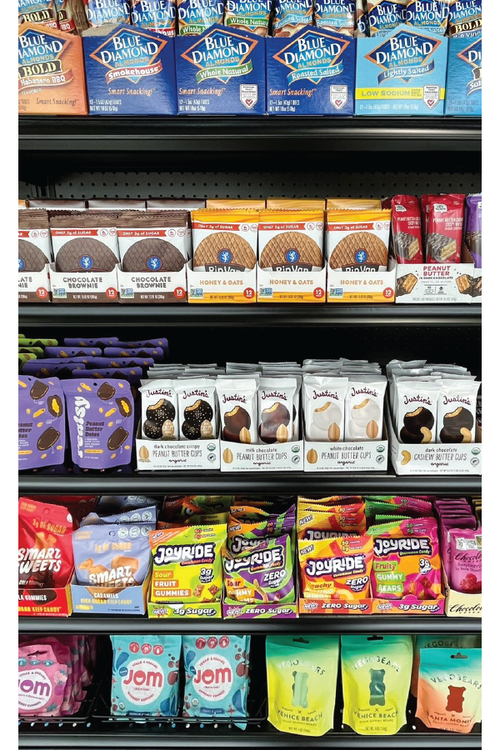 Shelves of snacks and candy at The Boring Bodega