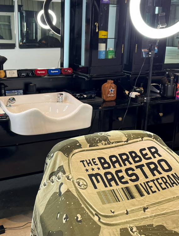 Barber chair and styling stations at His & Her Salon