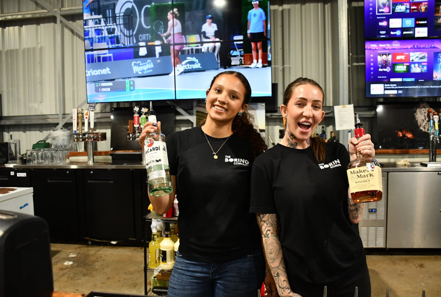 Bartenders behind the plaza bar